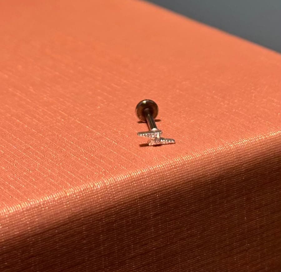 Piercing trágus raio