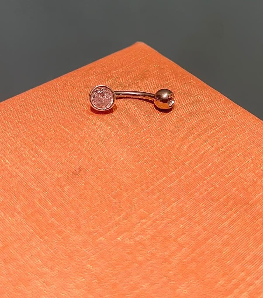Piercing umbigo ponto de luz (G)